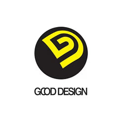 Straight-on view of the official Good Design award logo badge, featuring a solid black circle containing a stylized yellow graphic of the letter 'G' shaped like a curved arrow, positioned above the text 'GOOD DESIGN' where the two 'O's are overlapping, set against a white square background.