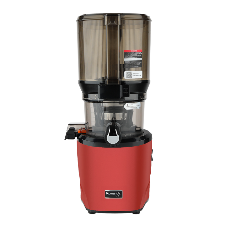 Red and black juicer on a white background