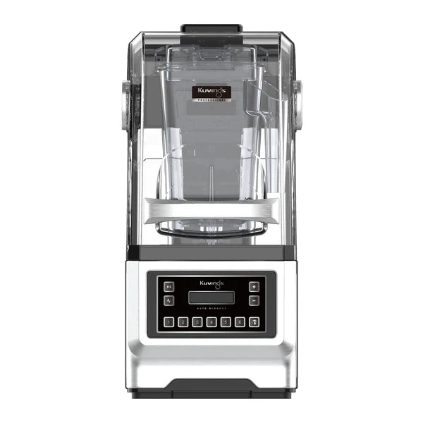 Straight-on, front view studio shot of the silver-colored Kuvings CB980 Professional Auto Blender enclosed within its clear soundproof shield cover, displaying the metallic finish of the motor base and the digital control panel against a white background.