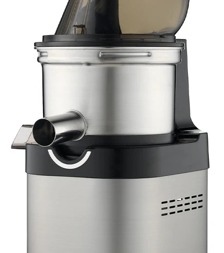 Straight-on close-up studio product shot of the upper drum assembly on a Kuvings Chef CS700 commercial slow juicer, showing its heavy-duty brushed stainless steel juicing bowl and spout mounted to the main stainless steel motor housing against a white background.