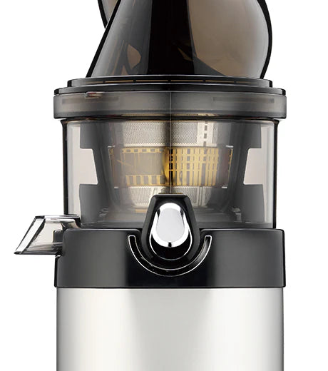 Straight-on, close-up studio shot of the upper drum section of a Kuvings CS600 Chef commercial slow juicer, showing the fine mesh stainless steel juicing strainer inside the clear bowl with its chrome smart cap closed, against a white background.