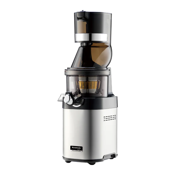 Kuvings CS600 silver metal slow juicer in perspective side view with visible spout.