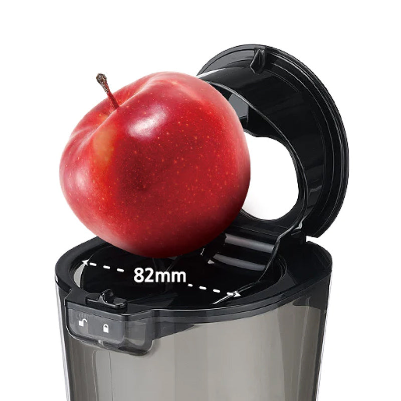 Kuvings EVO820 wide feeding chute with 82 mm opening for juicing whole apples and larger fruit pieces.