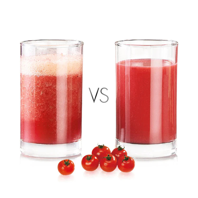 Studio product shot side-by-side comparison of two glasses of tomato juice on a white background with cherry tomatoes. The left glass shows foamy, separated conventional juice. The right glass shows rich, smooth, uniform Kuvings cold-pressed juice.